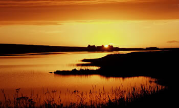 Sunset over Skaill Loch, Orkney.